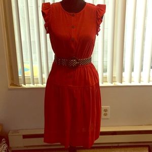 Red sleeveless dress with belt